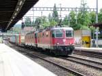 SBB - Re 4/4 11335 + Re /6/6 bei der durchfahrt im Bahnhof von Liestal am 02.08.2008