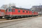 Re 6/6 11607 Wattwil und Re 4/4 11256 warten am 12.03.2009 in Oensingen auf neue Aufgaben.