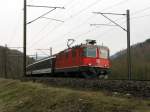 Re 4/4 II 11209 mit IR nach Basel SBB bei Gelterkinden am 14.03.2009