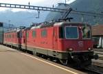 SBB-Cargo: Selten bekam man am 29.5.09 in Erstfeld eine rein-rote Re 10/10 zu sehen. Re 4/4 11252 und Re 6/6 11653  Gmligen  durchfahren Erstfeld.