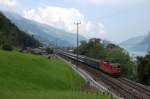 Re 4/4 mit InterRegio nach Chur am 01.07.2009 bei Unterterzen