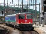 SBB - Re 4/4 11217 vor Schnellzug bei der einfahrt in den Bahnhof von Olten am 07.06.2009