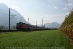 OEC 163 *Transalpin* aus Basel SBB mit Re 4/4 II 11228 an der Spitze  rauscht in Weite SG dem Grenzbahnhof Buchs SG entgegen.