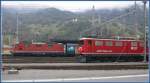 Re 4/4 II 11145 und Ge 6/6 II 706  Disentis  begegnen sich in Landquart (18.10.2009)