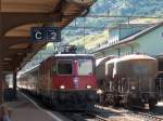 Re 4/4 11222 am 14.7.04 bei der Durchfahrt durch den Bahnhof Airolo.