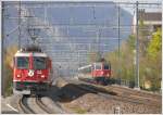 RE1252 mit Ge 4/4 II 618  Bergn/Bravuogn  und RE3825 mit Re 4/4 II 11217 erreichen gemeinsam Chur Wiesental.