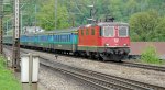 Die Re 4/4  11299 zieht am 07.05.10 einen EW -Pendelzug durch Olten.