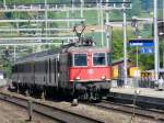 SBB - Re 4/4 11223 mit Schnellzug bei der einfahrt im Bahnhof Liestal am 24.05.2010