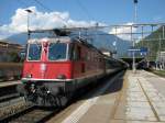 Re 4/4 11164 mit IR 2275 im Bahnhof Bellinzona, 09.08.2010.