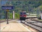 IR2178 von Locarno nach Luzern mit Re 4/4 II 11302 fhrt durch Immensee.