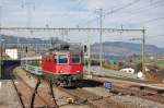 Re 4/4 II 11211 am 30.10.2010 mit Voralpenexpress in Immensee