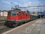 Re 4/4 II 11115 mit IR 2165 in Bellinzona.