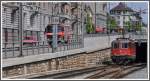 Beim Ausgang des Rosenbergtunnels in St.Gallen liefern sich Re 4/4 II 11115 und die Feuerwehr ein Wettrennen.