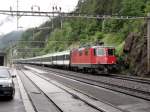 Re 4/4 II 11234 auf dem Weg nach Chiasso am 11.06.2011 bei Wassen.