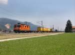 Die Re 4/4 11320 am 28.06.2011 mit einem Containerzug unterwegs bei Oensingen.