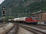 Die Re 4/4 11262 am 29.06.2011 mit einem Gterzug bei der Einfahrt in Brig.