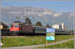 Re 11139 mit RE3819 bei Buchs mit den Kreuzbergen im Hintergrund.