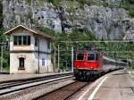 Die Re 4/4 11301 mit einem IR am 29.06.2009 bei der Einfahrt in St.