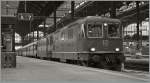 Re 4/4 II 11136 und 11109 mit einem Schnellzug in Basel SBB.