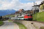 Re 4/4 11114 mit einem Voralpenxpress am 23.04.2012 bei Sattel.