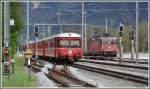 Die Re 4/4 II 11305 hat den Heineken Biercontainerzug nach Felsberg gebracht. Die S1 1518 mit Steuerwagen 1712 und Be 4/4 515 ist auf dem Weg nach Chur und Schiers. (0205.2012)