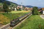 Re 4/4 11140 mit EC 74 bei Egolzwil, 19.08.1987.