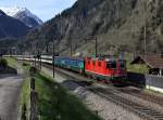 Die Re 4/4 11130 mit einem IR am 25.04.2012 unterwegs bei Silenen.