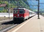 SBB - Re 4/4 11149 mit Schnellzug bei der einfahrt in den Bahnhof Erstfeld am 20.09.2012