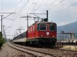 Die Re 4/4 11300 mit einem Regionalzug am 30.06.2009 unterwegs bei Biel Mett.