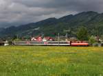 Die Re 4/4 11108 mit einem Reintalexpress am 09.05.2013 unterwegs bei Balgach.