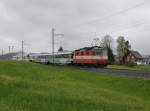 Die Re 4/4 11108 mit einem Voralpenexpress am 12.05.2013 unterwegs bei Biberbrugg.