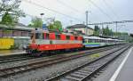 Die Swiss Express Re 4/4 II 11109 mit dem Voralpen Express 2419 bei Ausfahrt in St.