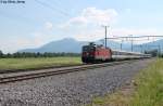 Re 4/4'' 11210 am 6.6.2013 bei der Durchfahrt in Rebstein-Marbach als RE 3834 nach St.Gallen.