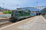 Re 4/4 II 11161 mit IR 2165 bei Ausfahrt in Bellinzona.