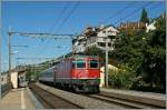 Die Re 4/4 II 11114 mit dem IR 1413 am 3.