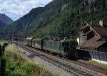 Re 4/4 11384 mit zwei Gterwagen am 29.08.2013 bei Amsteg-Silenen.