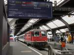 SBB - Re 4/4  11196 mit Ersatzzug im HB Zürich am 16.02.2014