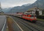 Leider mit dem Wetter kein Glck gehabt, dafr aber mit der Lok dieses EuroCity. Die Re 4/4 II 11109 mit Swiss-Express-Lackierung zieht am 16.03.2014 den von Zrich nach Graz fahrenden EC 163 'TRANSALPIN' durch den am Walensee liegenden Bahnhof von Mhlehorn.