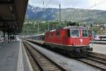 Die Re 4/4 II 11299 erreicht mit dem IR 2824 ihren Zielbahnhof Brig. Bei diesem Zug handelt es sich um einen 12 teiligen EWI NPZ Pendel, der längste planmässige EWI Pendel bei der SBB. Der Zug besteht aus 2 6-teiligen Simplon IR/R Pendeln, welche jeweils Samstags für diesen Zug zusammengehängt werden, 12.04.2014.