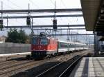 SBB - Re 4/4  11164 mit Extrazug unterwegs bei der durchfahrt in Rothrist am 30.03.2014