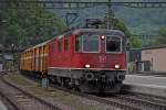 RE 4/4 II 11283 bringt den Postzug aus Chur über Ziegelbrücke nach Zürich.Foto vom 6.5.2014