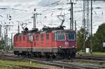 Eine Re 45/4 II 11285 und eine Re 4/4 III 11363 durchfahren den Badischen Bahnhof. Die Aufnahme stammt vom 13.08.2014.