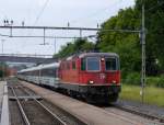 SBB - Re 4/4 11166 an der Spitze des Voralpenexpress bei der durchfahrt in Meggen am 09.08.2014