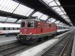 SBB - Lok Re 4/4 11299 im HB Zürich mit Zug nach Stuttgart am 30.11.2014