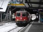 SBB - Re 4/4  11299 mit IC nach Zürich im Bahnhof Chur am 02.01.2015