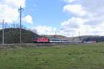 Re 4/4 II 11219 mit einem EWI/II S-Bahn Basel Einschaltpendel als Leermaterialzug Basel-Delmont-Porrentruy-Bure kurz nach Porrentruy.