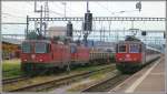 EC 196 aus Lindau mit 421 392-2 erreicht St.Margrethen.Daneben warten die Re 4/4 II 11253 und .... auf die Weiterfahrt. (16.06.2015)