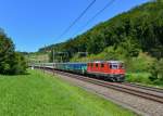 Re 4/4 11144 mit einem IR am 27.08.2012 bei Tecknau. 