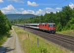 Re 4/4 11144 mit einem IR am 18.06.2014 bei Rupperswil. 