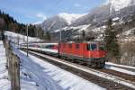 Re 4/4 II 11195 am 15.02.2016 mit dem IR 2315 bei Rodi-Fiesso.